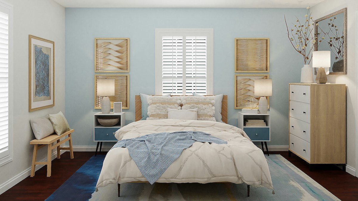Blue bedroom with a full bed frame